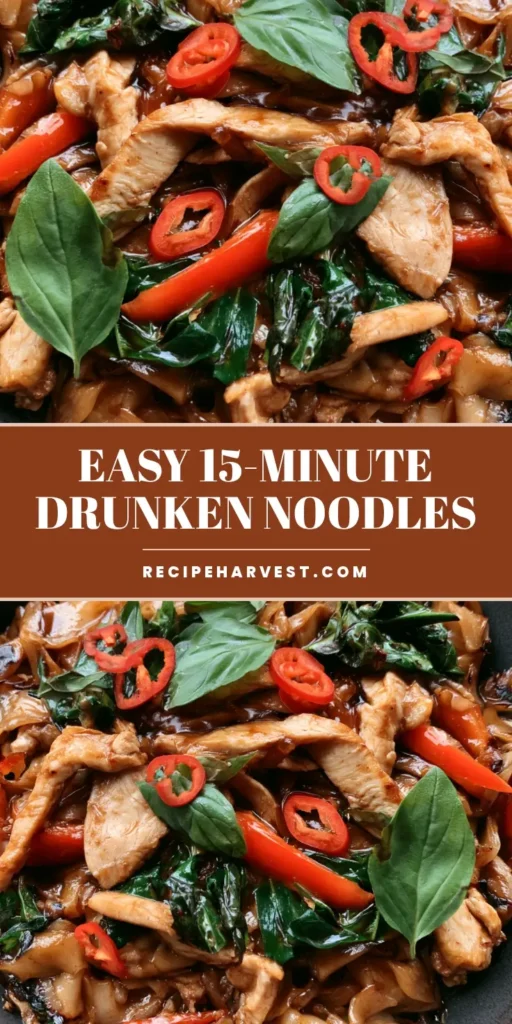 A close-up shot of Thai Drunken Noodles showing charred rice noodles, glossy mahogany sauce, seared chicken, and wilted Thai basil in a dark ceramic bowl.