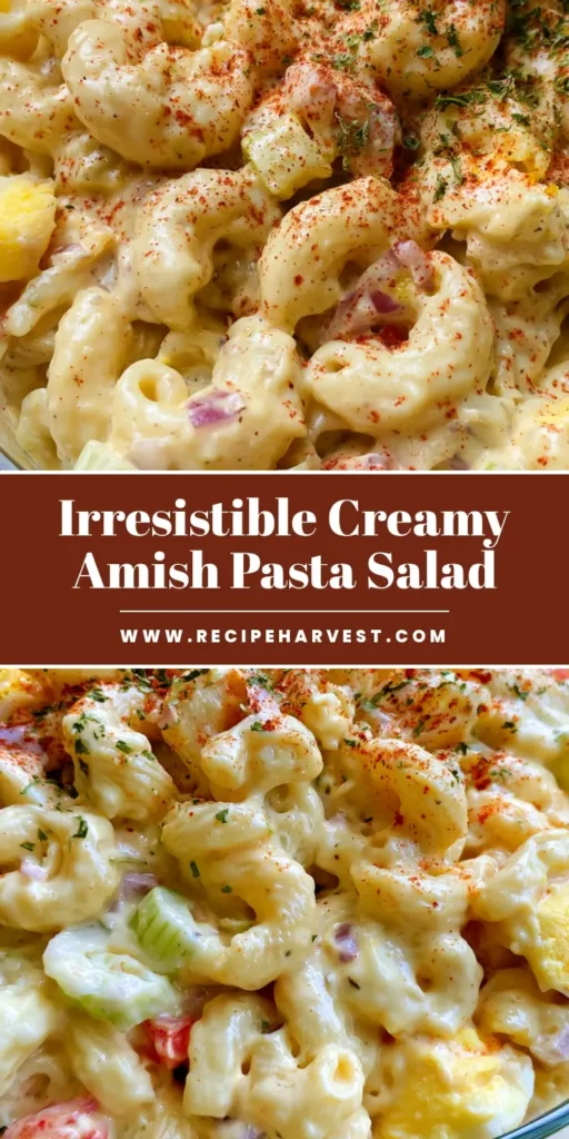 Amish Pasta Salad: The Creamiest Sweet and Tangy Macaroni Side 3 A clear glass bowl filled with creamy Amish Pasta Salad, featuring elbow macaroni, yellow dressing, cubed eggs, red peppers, and a dusting of smoked paprika on a wooden table. (Amish Pasta Salad)