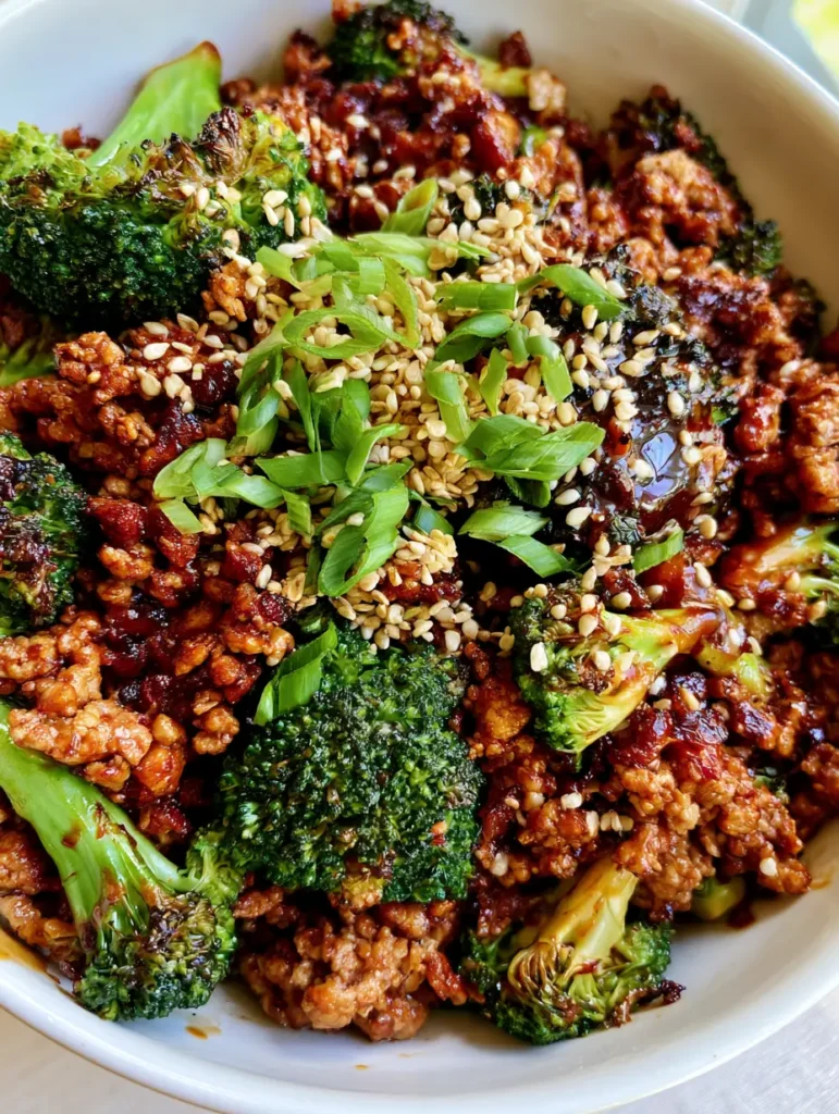 Detailed shot of Ground Turkey Stir Fry coated in a glossy ginger-soy glaze with sesame seeds.